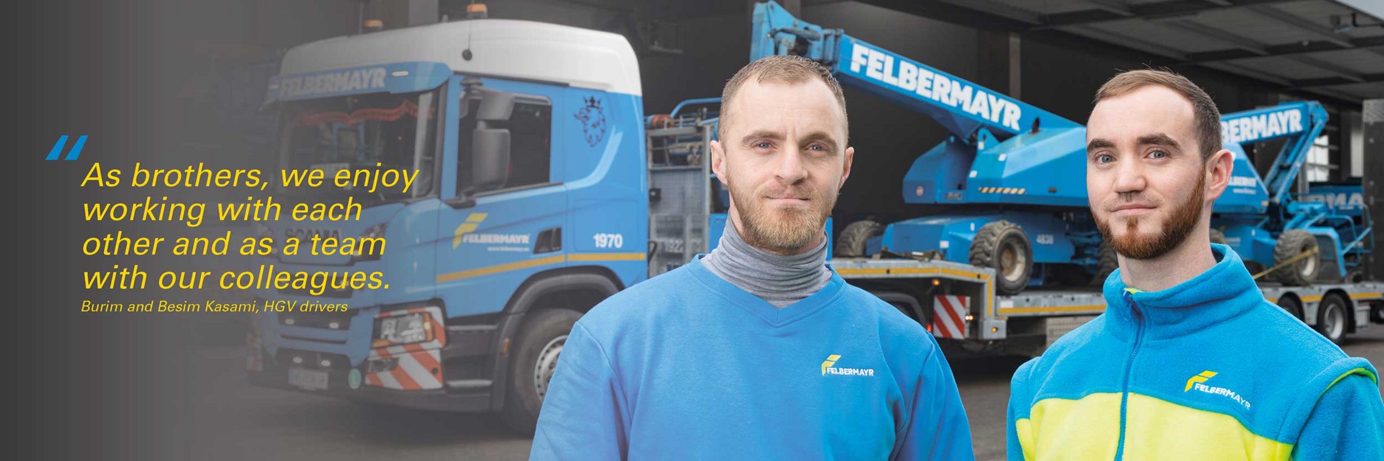 © Felbermayr/Weickinger Zwei Mitarbeiter stehen vor Ihrem Bühnentransporter